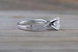 Gold Infinity Twist Moissanite Engagement Ring Charles & Colvard M3085 Lab Grown Diamond