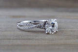 Gold Infinity Twist Moissanite Engagement Ring Charles & Colvard M3085 Lab Grown Diamond