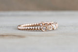 Round Cut Diamond in Marquis and Round Bezel Rope Twined Vine Ring