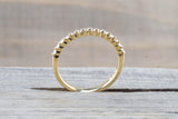18kt Yellow Gold Shared Single Prong Diamond Band