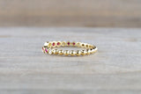 18kt Yellow Gold Round Cut Ruby and Diamond Bezel Fashion Ring Bead Design Band