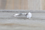 FOREVER ONE Charles and Colvard Moissanite Round Shared Prong Single Bead Engagement Ring